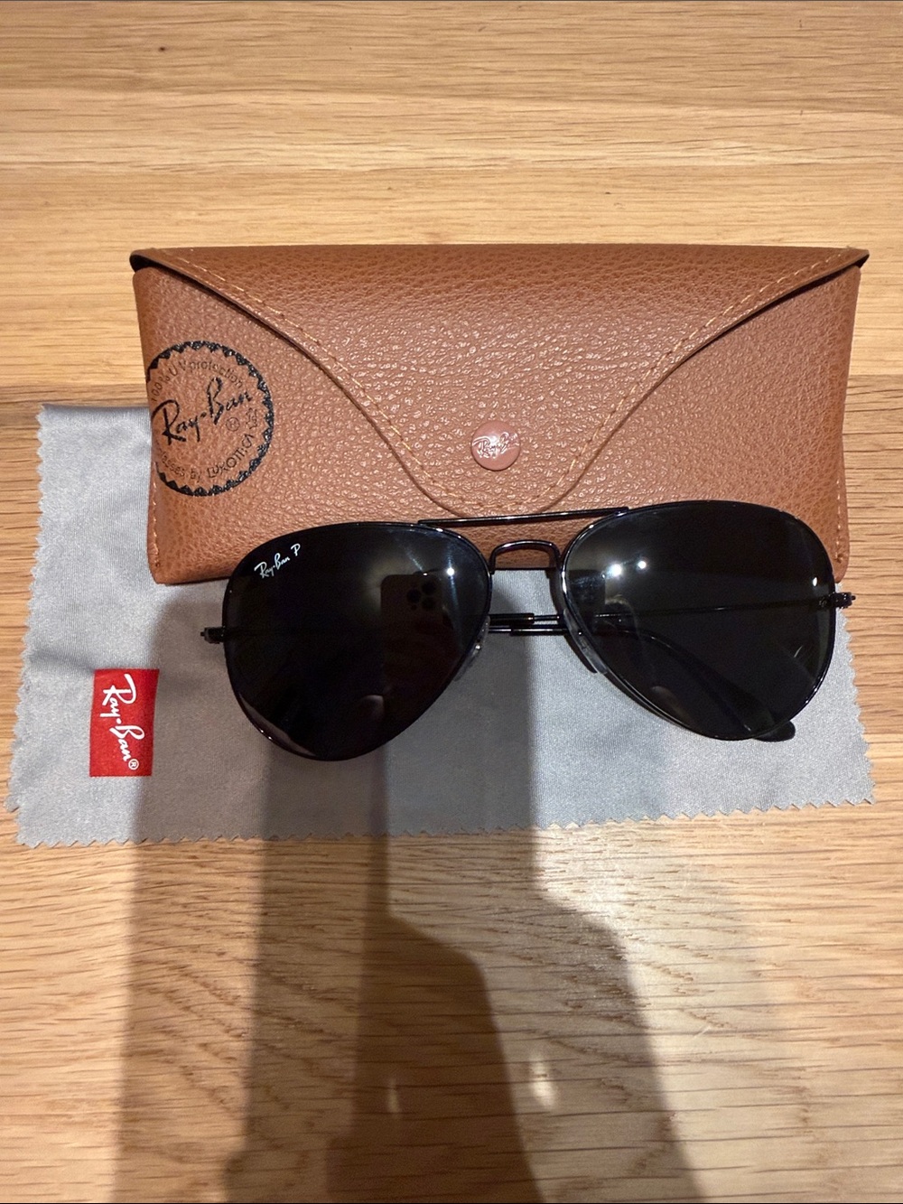 Ray-Ban Aviator Sunglasses with Black Lenses and Black Frame